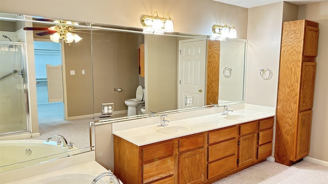 full bath featuring a garden tub, a stall shower, double vanity, and a ceiling fan