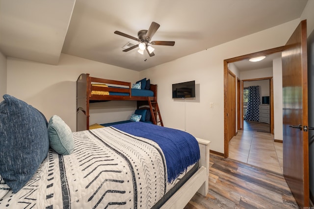 36 Lequita Pl, Hot Springs Village, AR 71909 - bedroom with wood finished floors, a ceiling fan, and baseboards