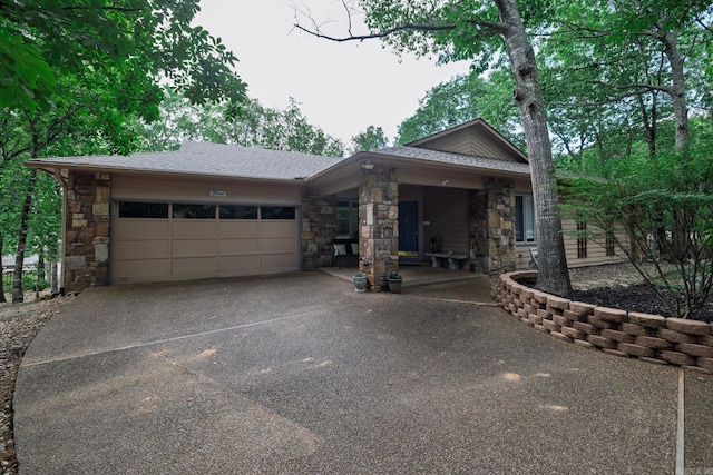 3 Tenerife Way, Hot Springs Village, AR 71909 - view of front of house with stone siding, driveway, a garage, and a shingled roof