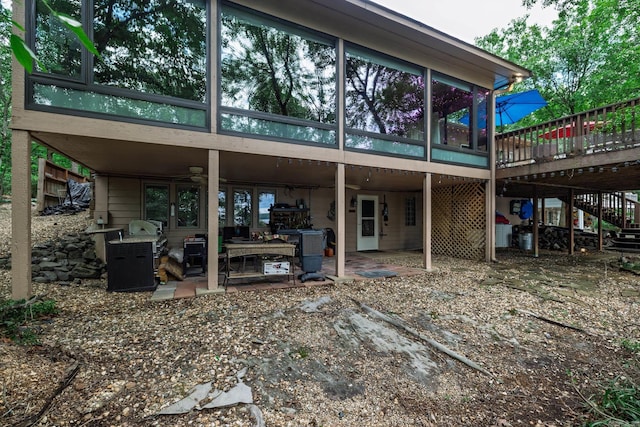 3 Tenerife Way, Hot Springs Village, AR 71909 - rear view of property with a sunroom, a patio, ceiling fan, stairs, and a wooden deck