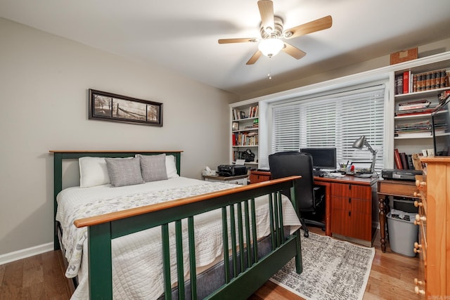3 Tenerife Way, Hot Springs Village, AR 71909 - bedroom featuring an office area, light wood-style flooring, a ceiling fan, and baseboards