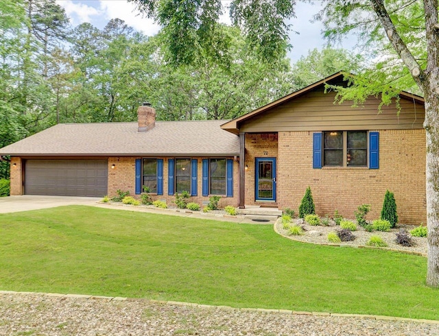 72 Pintuerero Way, Hot Springs Village, AR 71909 - view of front of house with brick siding, an attached garage, driveway, a chimney, and a front yard
