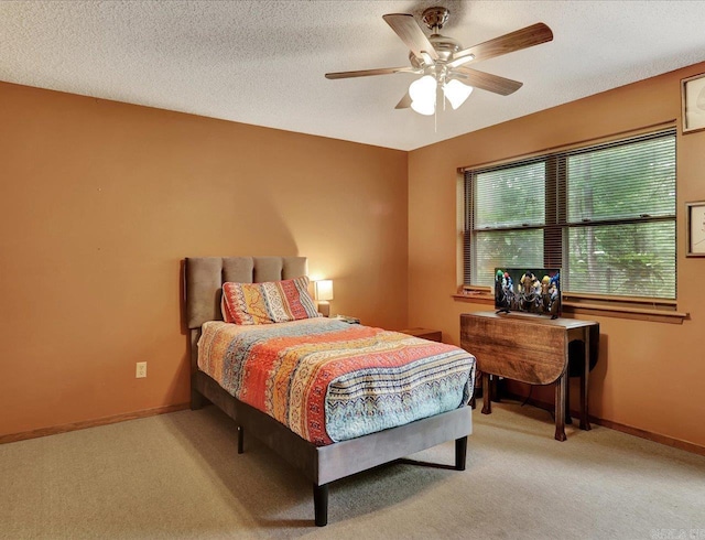 72 Pintuerero Way, Hot Springs Village, AR 71909 - carpeted bedroom with baseboards, ceiling fan, and a textured ceiling