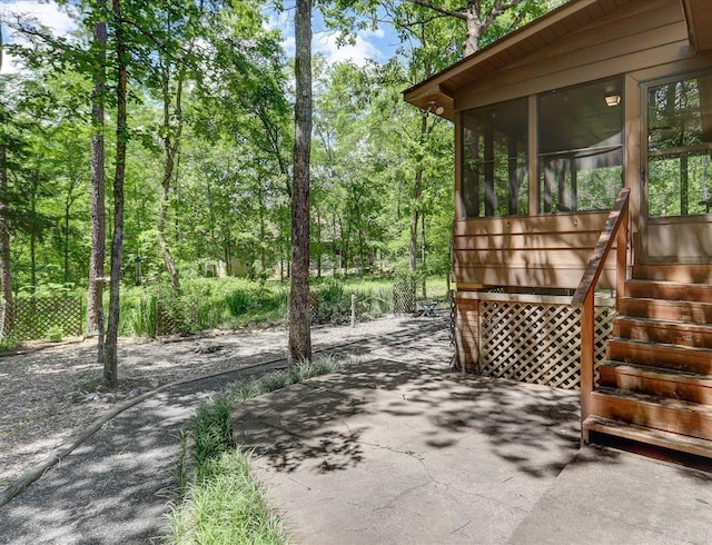 72 Pintuerero Way, Hot Springs Village, AR 71909 - view of patio / terrace featuring a sunroom