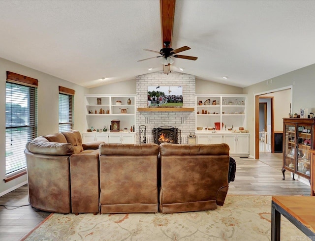 72 Pintuerero Way, Hot Springs Village, AR 71909 - living room with ceiling fan, light wood finished floors, a brick fireplace, and built in shelves