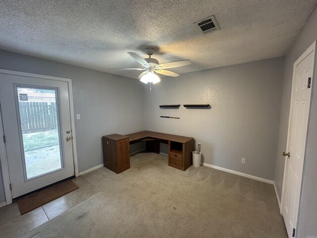 2608 Timbermist Cir, Benton, AR 72015 - unfurnished office featuring a ceiling fan, baseboards, a textured ceiling, and light carpet