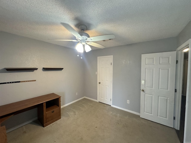 2608 Timbermist Cir, Benton, AR 72015 - unfurnished bedroom featuring carpet flooring, a ceiling fan, baseboards, and a textured ceiling