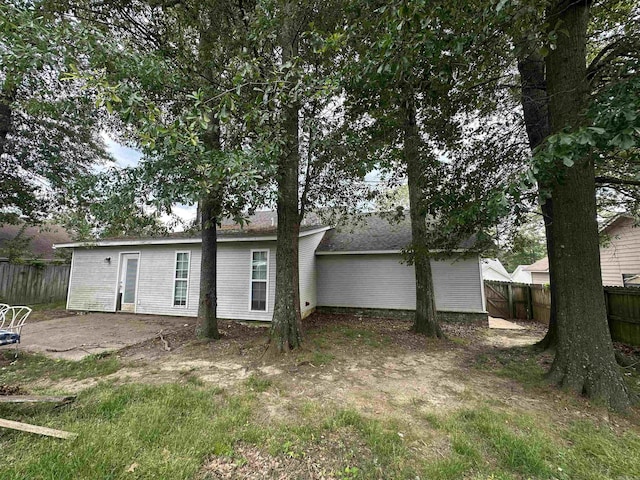 2608 Timbermist Cir, Benton, AR 72015 - rear view of house with fence