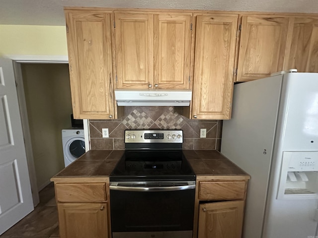 2608 Timbermist Cir, Benton, AR 72015 - kitchen featuring ventilation hood, range with electric stovetop, washer / dryer, white refrigerator with ice dispenser, and backsplash
