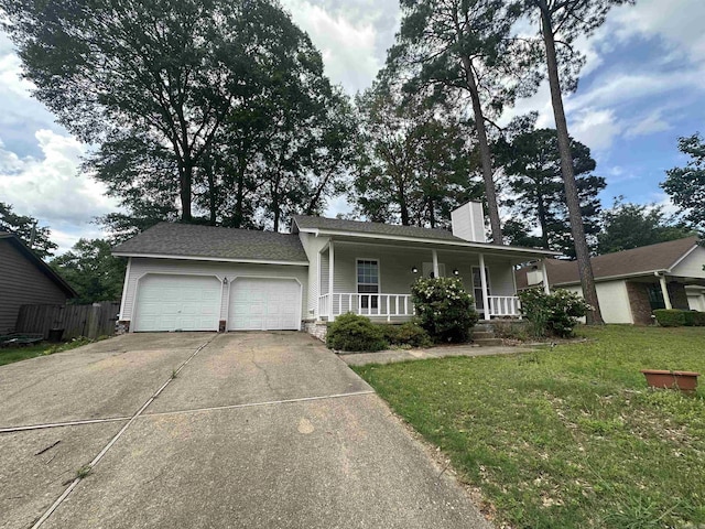 2608 Timbermist Cir, Benton, AR 72015 - view of front of house featuring covered porch, a garage, a chimney, and driveway