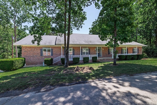 72 Ranch Rd, Arkadelphia, AR 71923 - ranch-style house with covered porch, brick siding, and a front yard