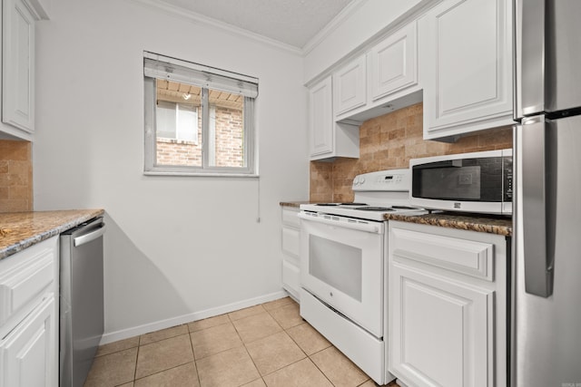1121 Twin Pts Unit 1121C, Hot Springs, AR 71913 - kitchen with appliances with stainless steel finishes, ornamental molding, backsplash, white cabinetry, and baseboards