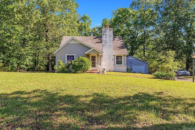 7606 Westwood Ave, Little Rock, AR 72204 - view of front facade with a garage, a front lawn, a chimney, and roof with shingles