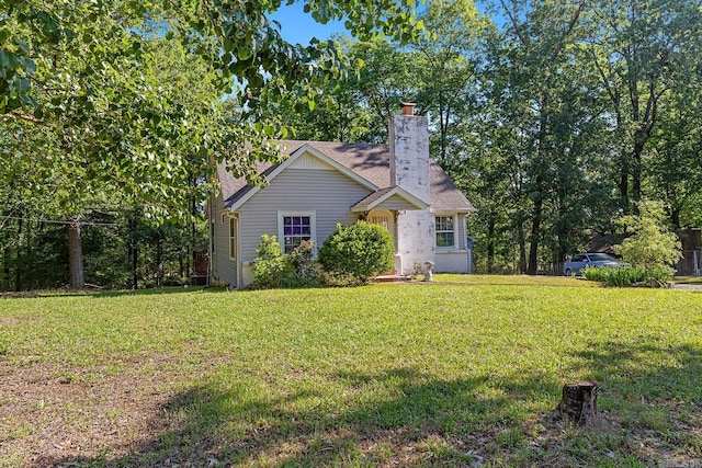 7606 Westwood Ave, Little Rock, AR 72204 - view of front of property with a chimney and a front lawn