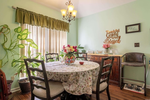 3218 Mcfadden Rd, Pine Bluff, AR 71602 - dining room with a chandelier and dark wood finished floors
