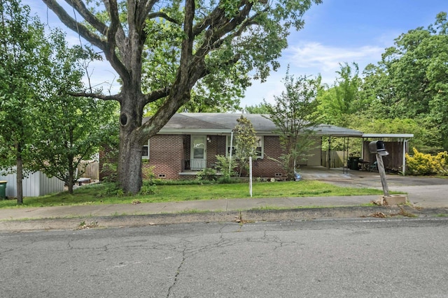 view of front of property with concrete driveway and brick siding