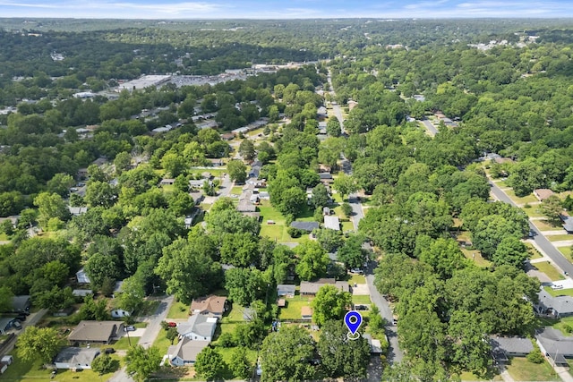 drone / aerial view of a heavily wooded area