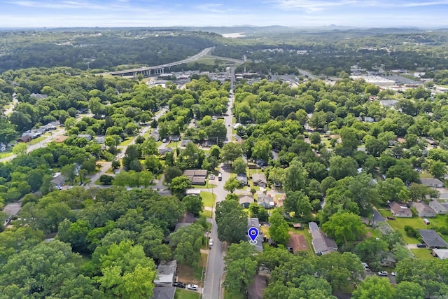 drone / aerial view of a heavily wooded area