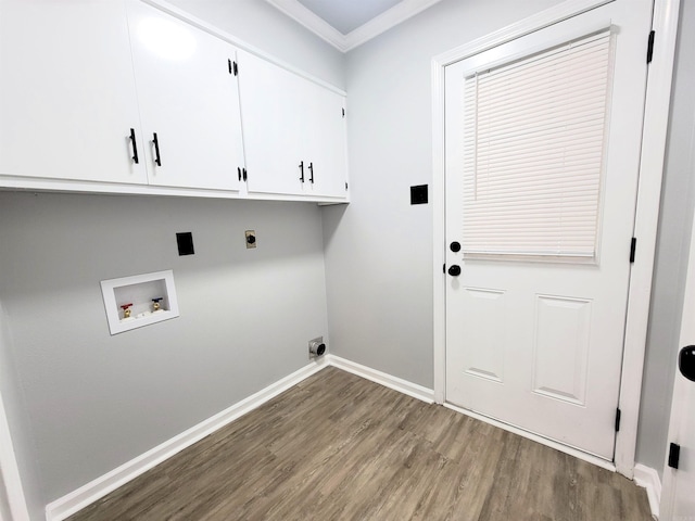 1907 Sunset, Pine Bluff, AR 71603 - clothes washing area featuring cabinet space, wood finished floors, hookup for a washing machine, baseboards, and hookup for an electric dryer