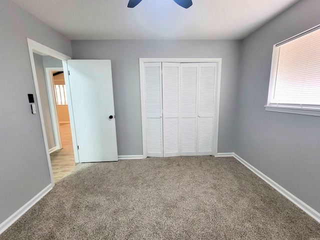 1907 Sunset, Pine Bluff, AR 71603 - unfurnished bedroom with carpet flooring, a closet, and baseboards