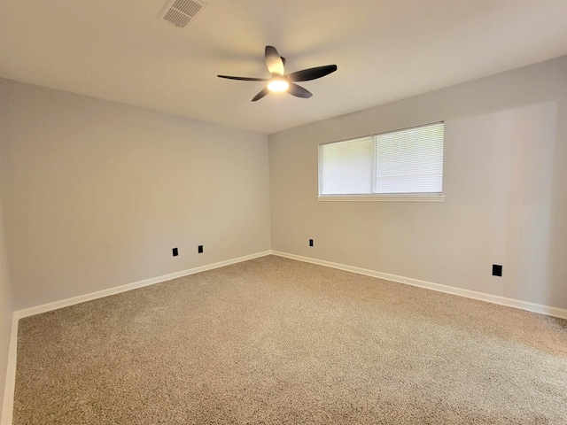 1907 Sunset, Pine Bluff, AR 71603 - unfurnished room featuring a ceiling fan, carpet flooring, and baseboards