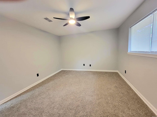 1907 Sunset, Pine Bluff, AR 71603 - carpeted spare room with ceiling fan and baseboards
