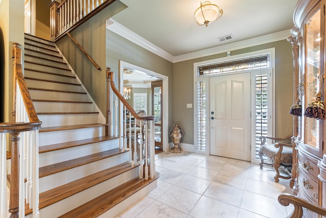 852 Rock Ledge Rd, Heber Springs, AR 72543 - entrance foyer with crown molding, stairway, light tile patterned floors, and baseboards