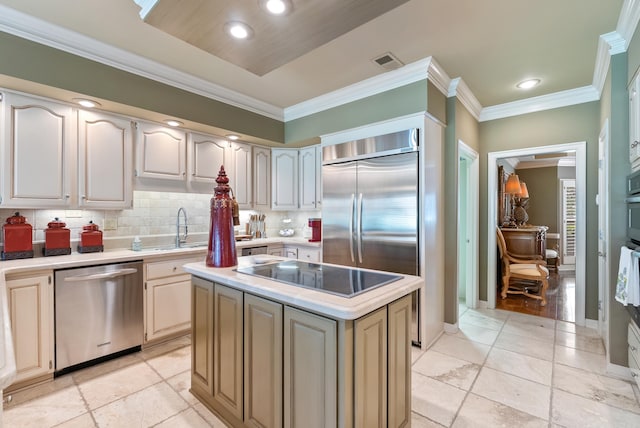 852 Rock Ledge Rd, Heber Springs, AR 72543 - kitchen featuring appliances with stainless steel finishes, a sink, light countertops, backsplash, and ornamental molding