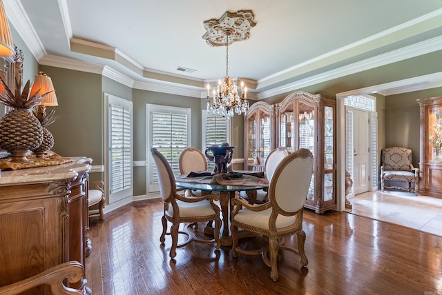 852 Rock Ledge Rd, Heber Springs, AR 72543 - dining area featuring a chandelier, dark wood finished floors, baseboards, a raised ceiling, and crown molding