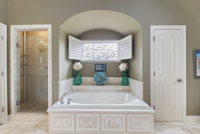 852 Rock Ledge Rd, Heber Springs, AR 72543 - bathroom with a stall shower, a garden tub, and tile patterned floors