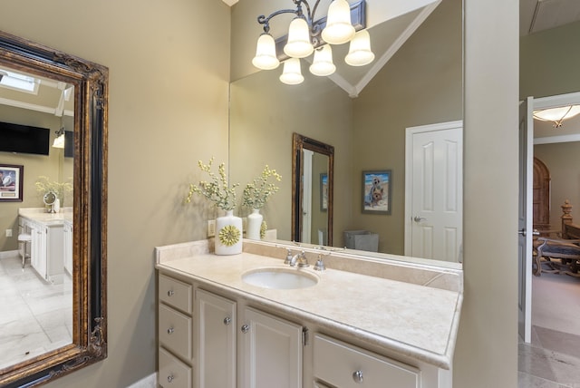 852 Rock Ledge Rd, Heber Springs, AR 72543 - bathroom with crown molding, high vaulted ceiling, a chandelier, baseboards, and vanity
