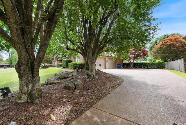 852 Rock Ledge Rd, Heber Springs, AR 72543 - obstructed view of property featuring concrete driveway