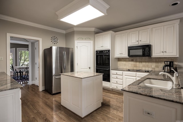 6 Frecourt Ln, Little Rock, AR 72223 - kitchen featuring black appliances, a sink, white cabinets, ornamental molding, and dark stone countertops