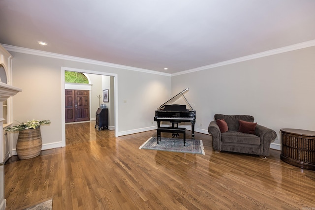 6 Frecourt Ln, Little Rock, AR 72223 - sitting room with baseboards, recessed lighting, wood finished floors, and ornamental molding