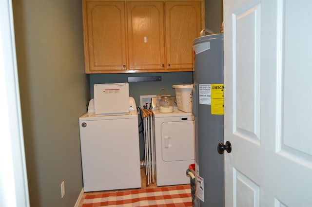 1059 Piney Rd, De Queen, AR 71832 - washroom featuring electric water heater, washer and clothes dryer, cabinet space, and baseboards
