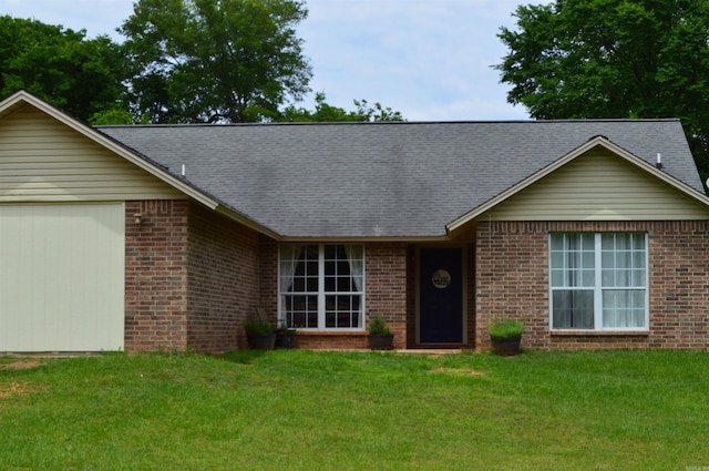 1059 Piney Rd, De Queen, AR 71832 - ranch-style home with a front yard, brick siding, and an attached garage