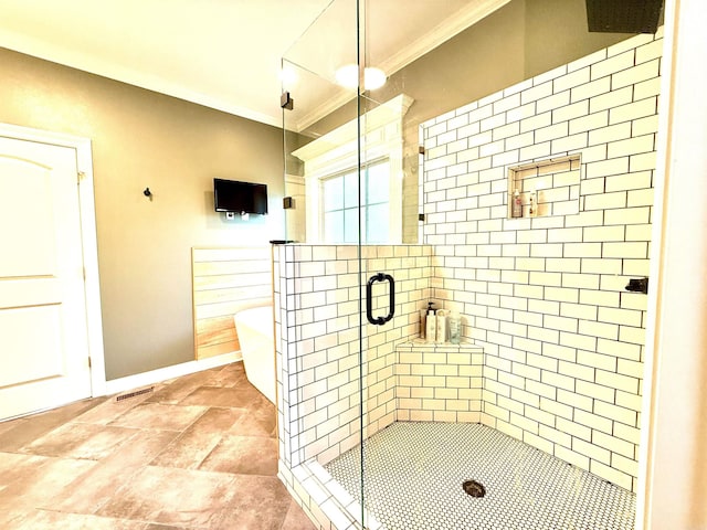 14 Windrush Pt, Little Rock, AR 72211 - bathroom with a stall shower, ornamental molding, a soaking tub, and baseboards