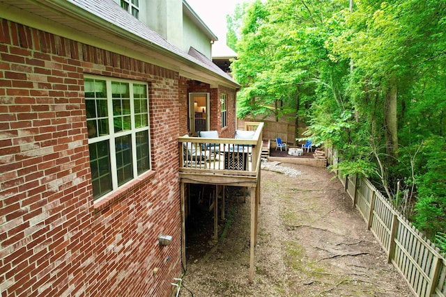 14 Windrush Pt, Little Rock, AR 72211 - wooden deck with fence and outdoor dining space