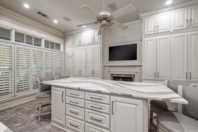 12 Darro Way, Hot Springs Village, AR 71909 - home office featuring ceiling fan, a fireplace, recessed lighting, and ornamental molding