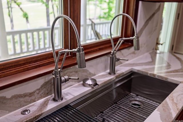12 Darro Way, Hot Springs Village, AR 71909 - kitchen view of a sink and light stone counters