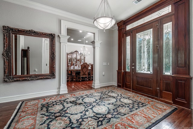 12 Darro Way, Hot Springs Village, AR 71909 - entryway featuring wood-type flooring, ornamental molding, a chandelier, baseboards, and decorative columns