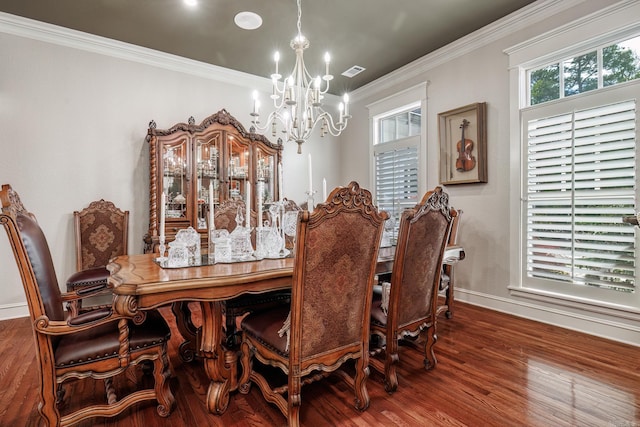 12 Darro Way, Hot Springs Village, AR 71909 - dining area featuring a chandelier, wood finished floors, baseboards, and ornamental molding