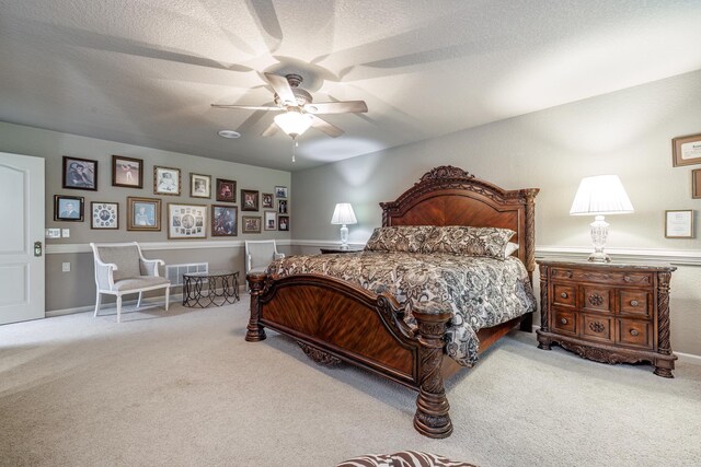 12 Darro Way, Hot Springs Village, AR 71909 - bedroom featuring carpet flooring, a ceiling fan, and a textured ceiling
