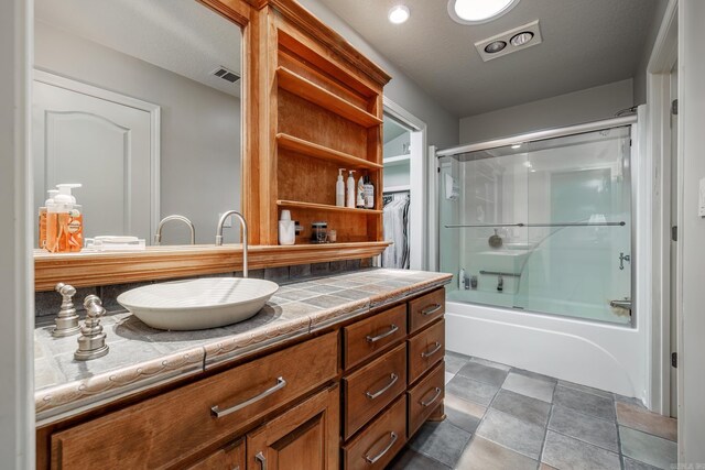12 Darro Way, Hot Springs Village, AR 71909 - bathroom featuring combined bath / shower with glass door and vanity