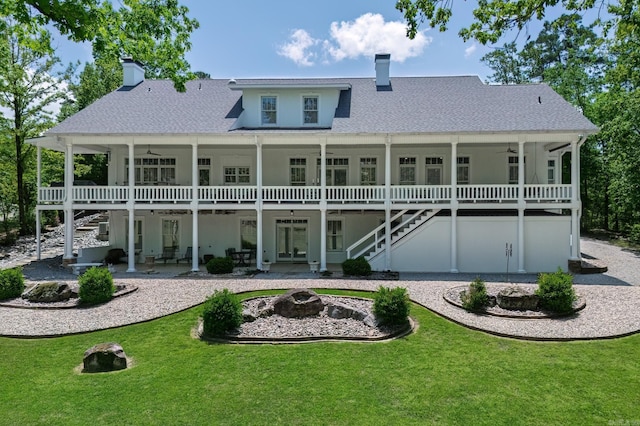 12 Darro Way, Hot Springs Village, AR 71909 - back of property with stairway, a ceiling fan, an outdoor fire pit, and a chimney