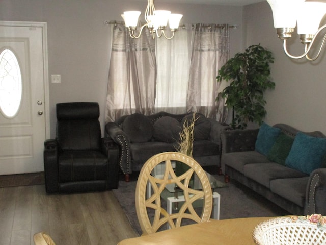 4005 Arapaho Trl, Little Rock, AR 72209 - living area featuring a chandelier and wood finished floors
