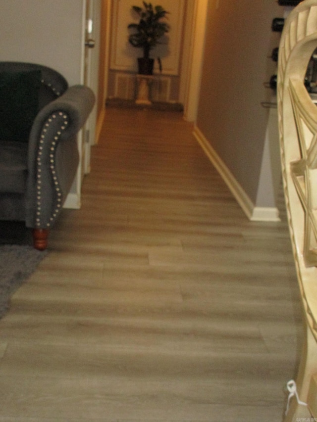 4005 Arapaho Trl, Little Rock, AR 72209 - corridor featuring baseboards and wood finished floors