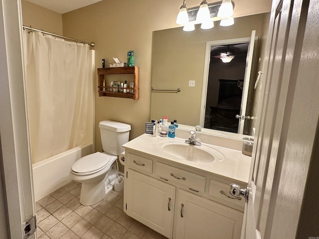 bathroom featuring tile patterned floors, vanity, toilet, ceiling fan, and shower / bath combo