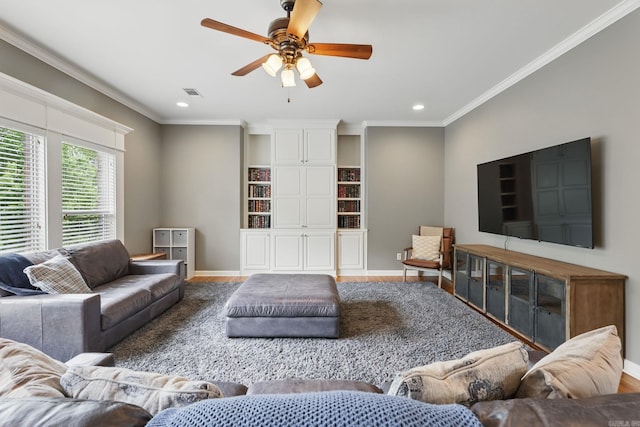 15 Challain Cv, Little Rock, AR 72223 - living area featuring baseboards, recessed lighting, wood finished floors, crown molding, and a ceiling fan
