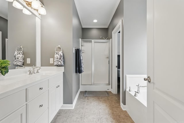 15 Challain Cv, Little Rock, AR 72223 - bathroom with vanity, ornamental molding, a stall shower, a garden tub, and tile patterned floors